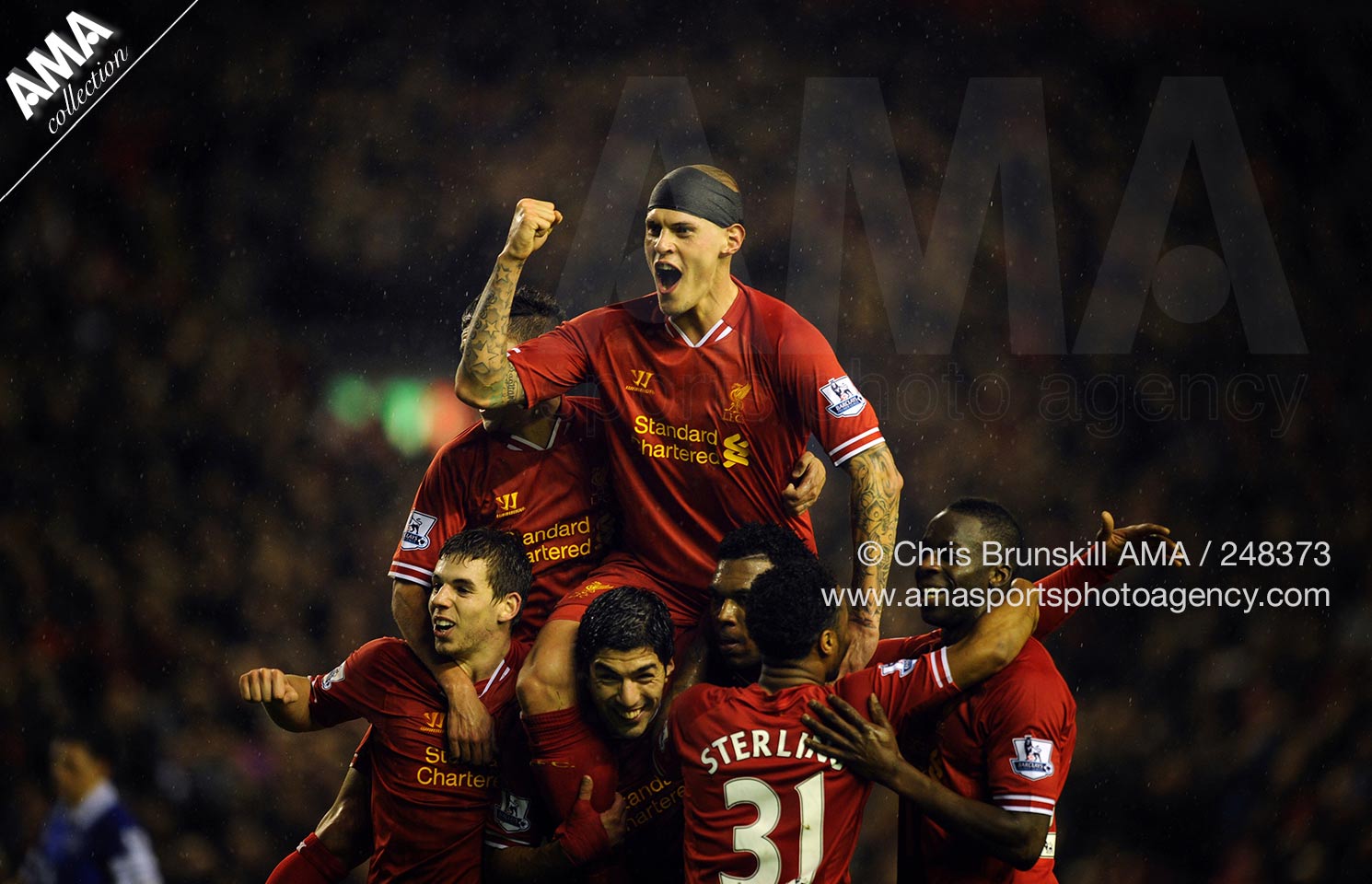 28 01 2014 Barclays Premier League - Liverpool v Everton - Liverpool players celebrate after Daniel Sturridge scored a goal to make it 3-0