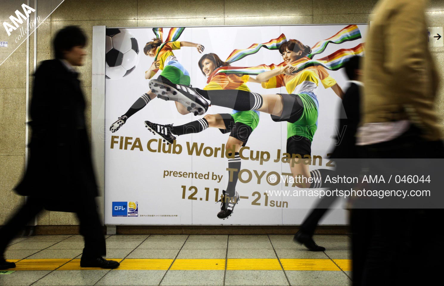 10 December 2008 - FIFA Club World Cup 2008 - Tokyo commuters pass a poster advertising the FIFA Club World Cup 2008 in Kayabacho Metro Station, Tokyo