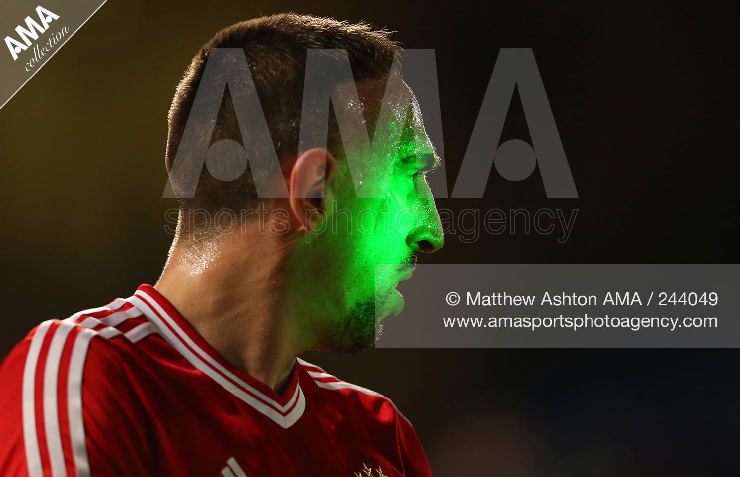 21 December 2013 - FIFA Club World Cup 2013 - FINAL - Bayern Munich v Raja Casablanca - A green laser is shone onto the face of Franck Ribery of Bayern Munich as he prepares to take a corner