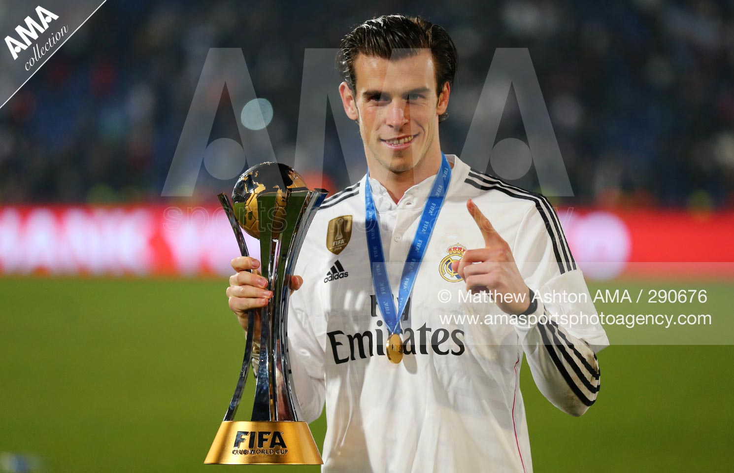 20 December 2014 - FIFA Club World Cup 2014 - Final - Real Madrid v San Lorenzo - Gareth Bale of Real Madrid with the FIFA Club World Cup trophy after defeating San Lorenzo