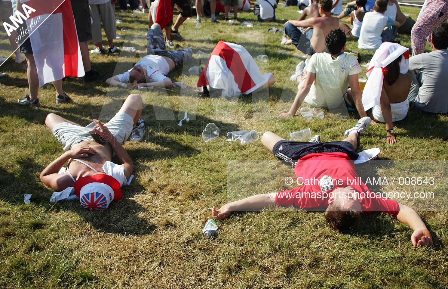 02 July 2006 - FIFA World Cup 2006 - Quarter Final - England v Portugal  - England fans pass out after drinking in the heat at the Fan Fest in Gelsenkirchen
