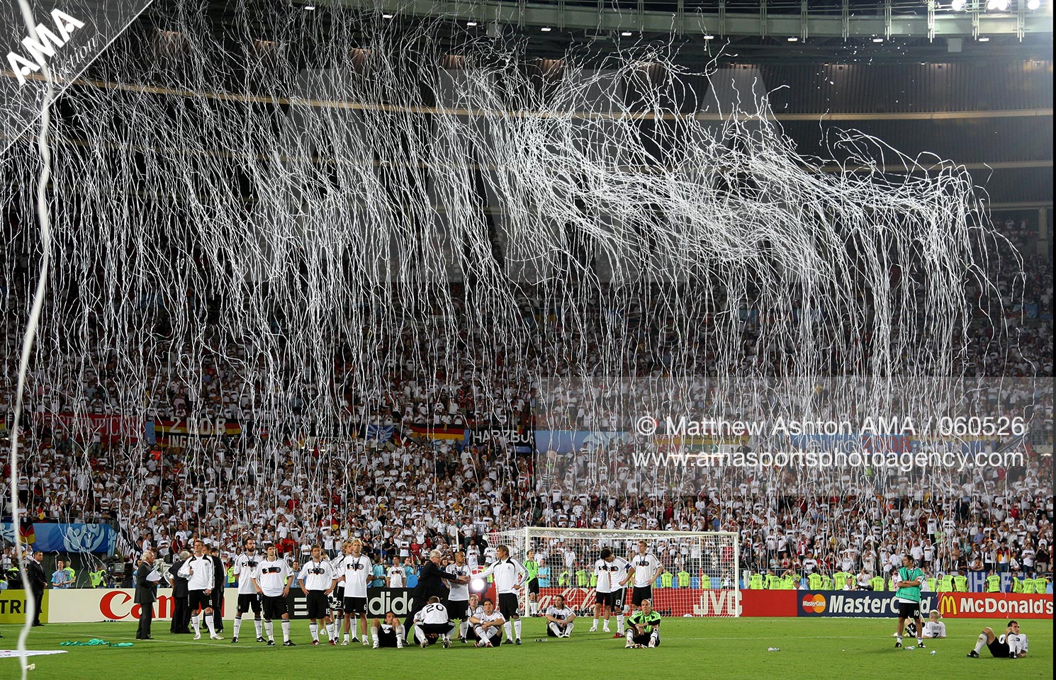 29 June 2008 - Euro 2008 - Final - Germany v Spain - Dejected Germany players watch as Spain go and collect the trophy after losing to them 1-0 in the final of Euro 2008