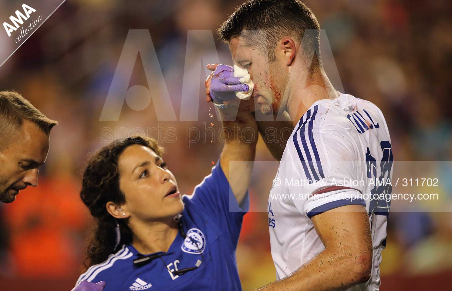  Eva Carneiro attends to Gary Cahill of Chelsea AMA Matthew Ashton