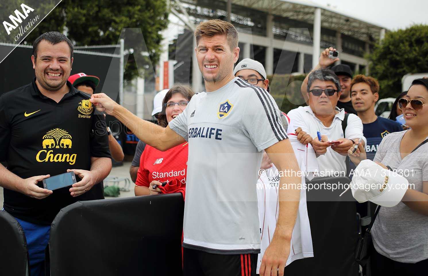 22 August 2015 Steven Gerrard feature at LA Galaxy - Steven Gerrard mocks a soccer fan wearing an Everton shirt after the LA Galaxy training session   © Matthew Ashton / AMA 318301