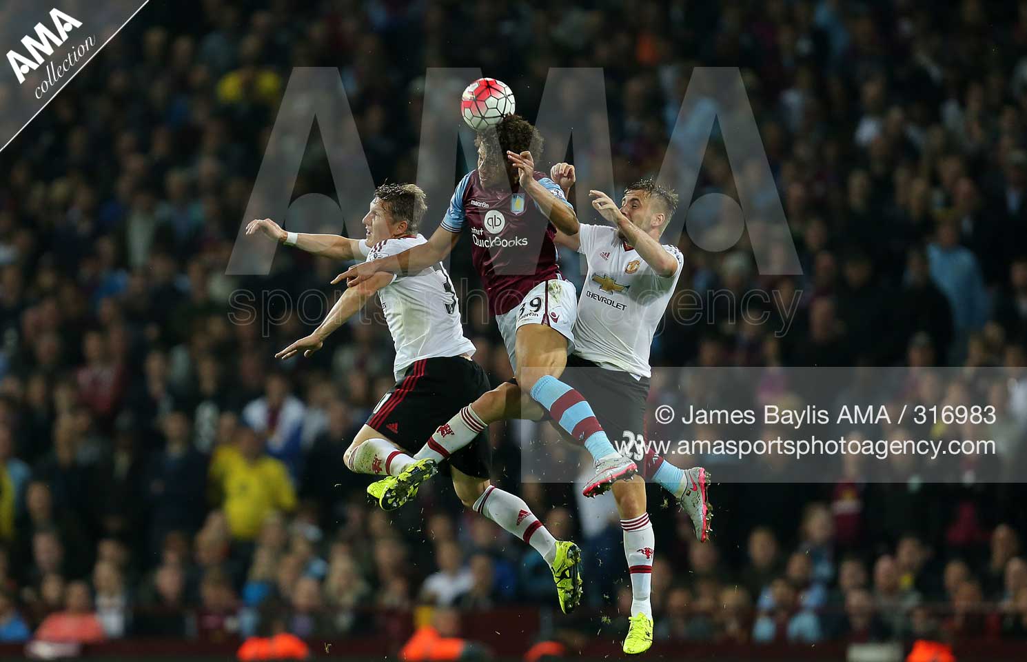 14 August 2015  Barclays Premier League - Aston Villa v Manchester United - Rudy Gestede of Aston Villa is challenged by Bastian Schweinsteiger and Luke Shaw of Manchester United © James Baylis / AMA 316983