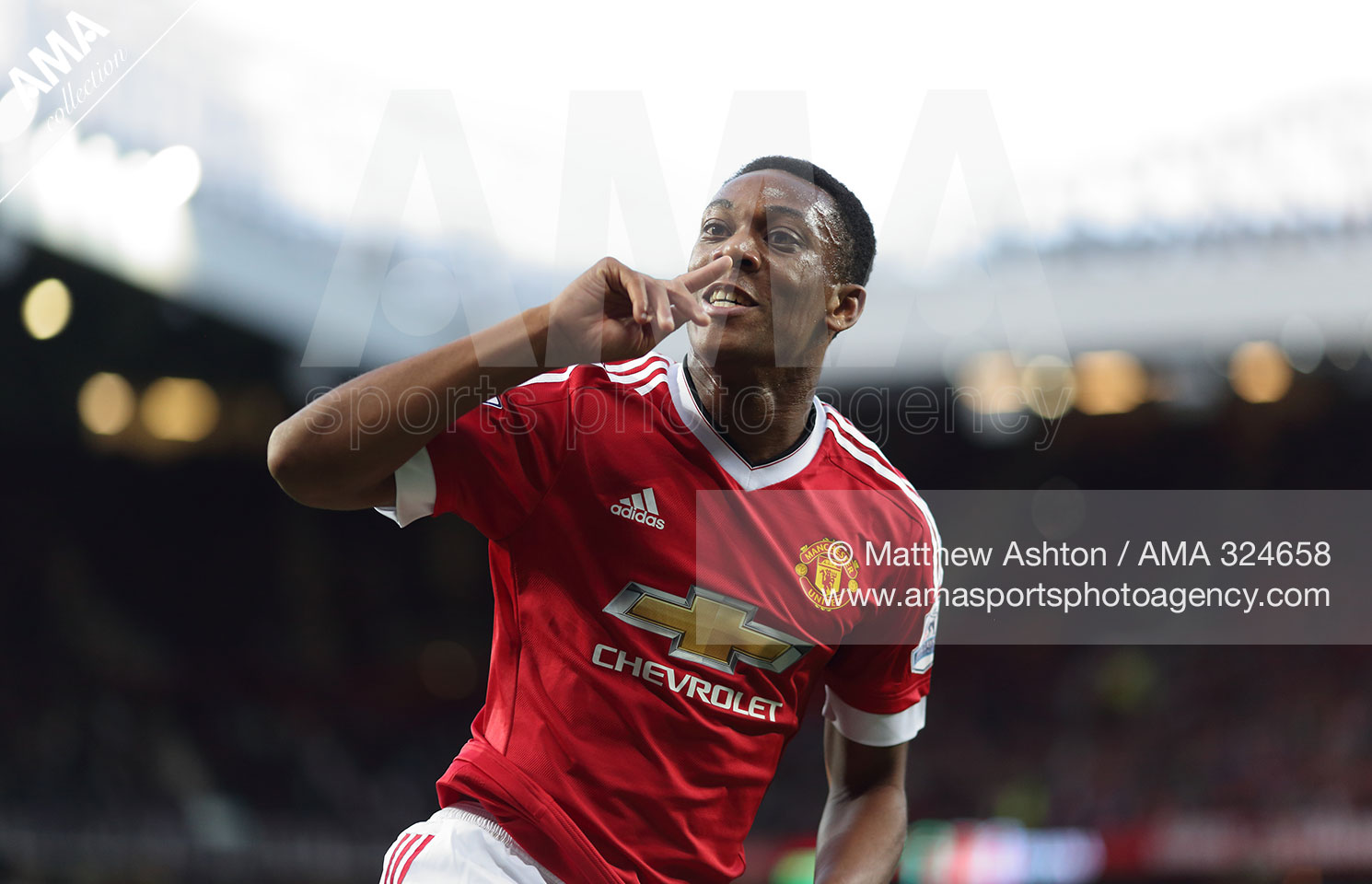 Anthony Martial of Manchester United celebrates after scoring a goal to make it 3-1 on his debut