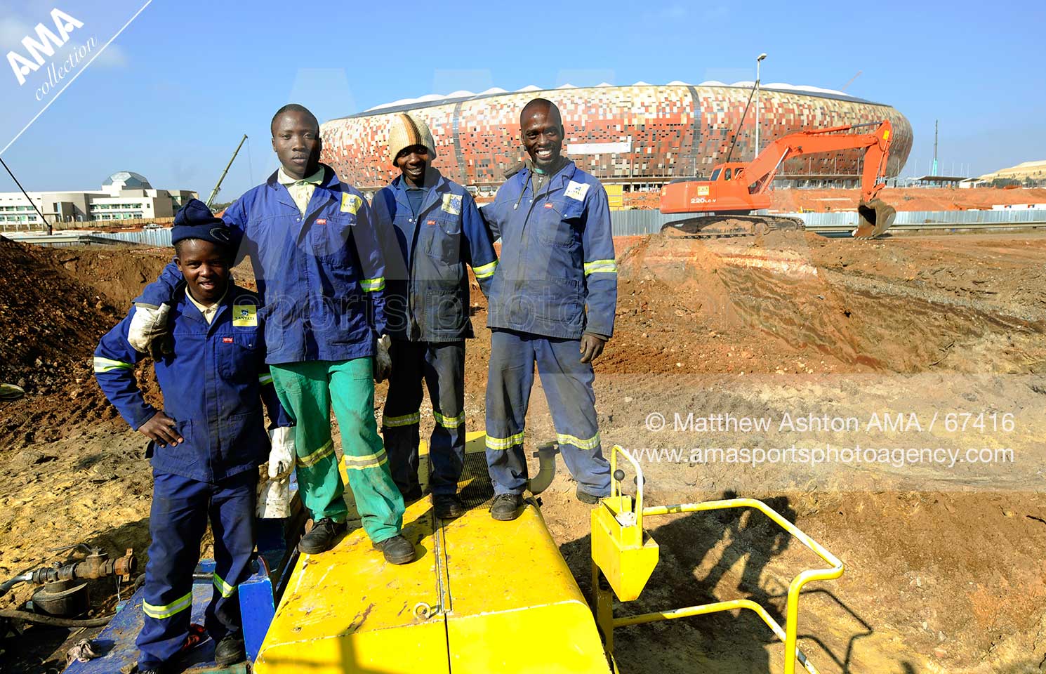 Workers on the construction site of Soccer City, the stadium venue for the 2010 South Africa FIFA World Cup in Johannesburg