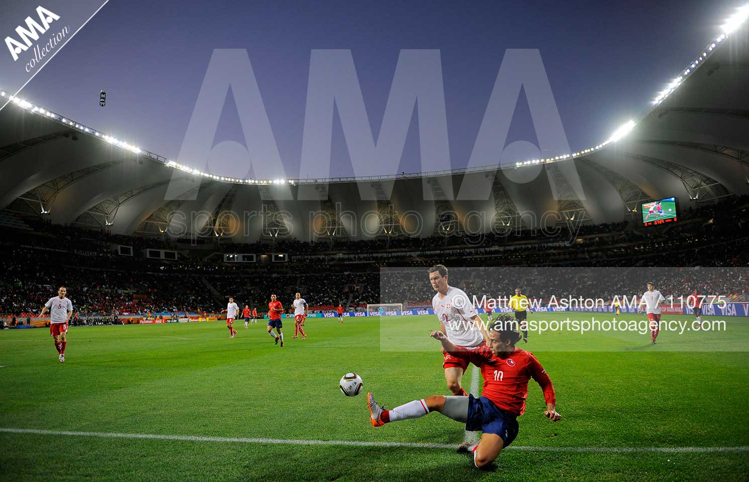Stephan Lichtsteiner of Switzerland and Jorge Valdivia of Chile battle for the ball in the Nelson Mandela Bay Stadium in Port Elizabeth, South Africa