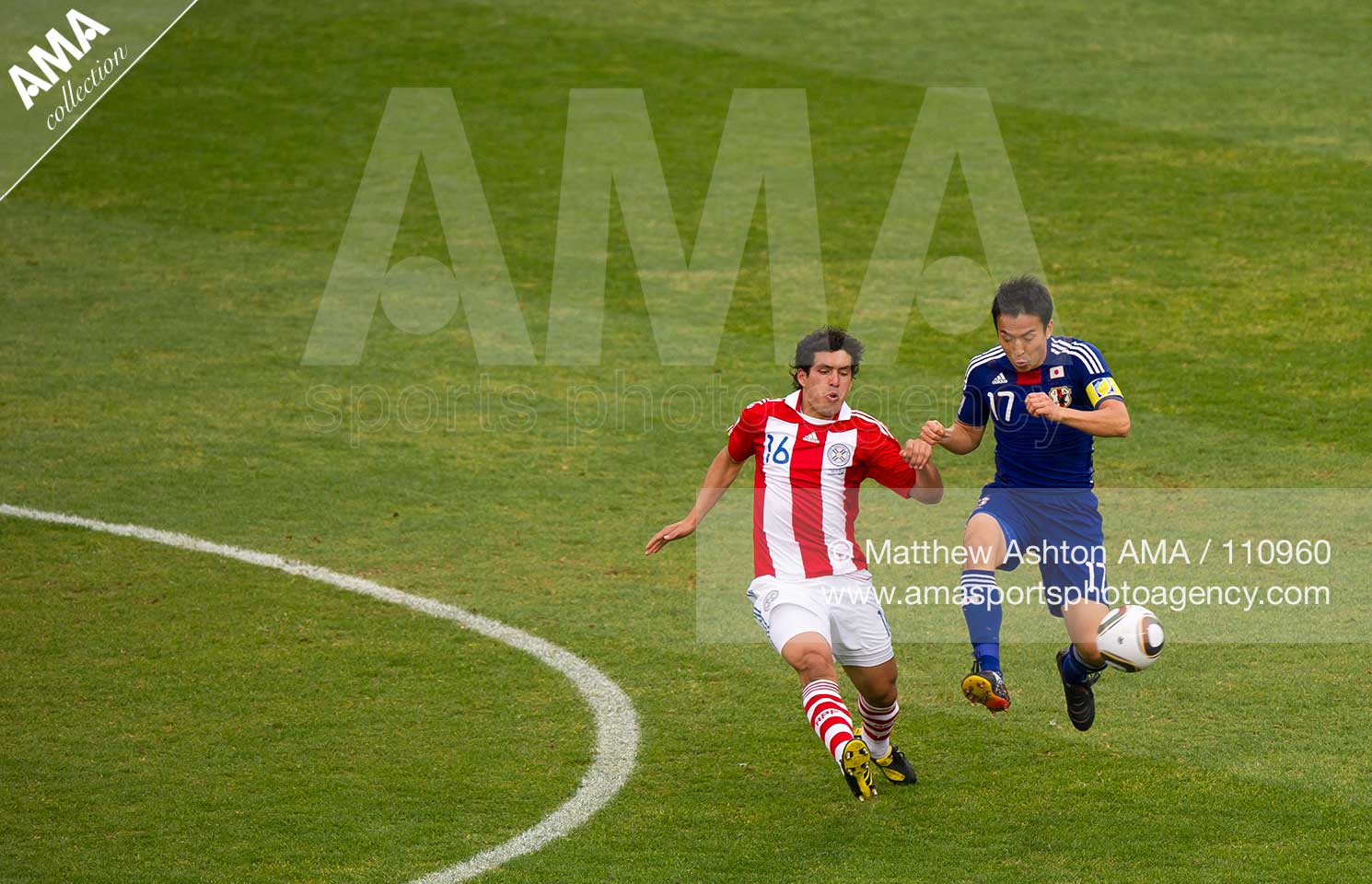 2010 FIFA World Cup South Africa - Round of 16 - Paraguay v Japan Cristian Riveros of Paraguay and Makato Hasebe of Japan