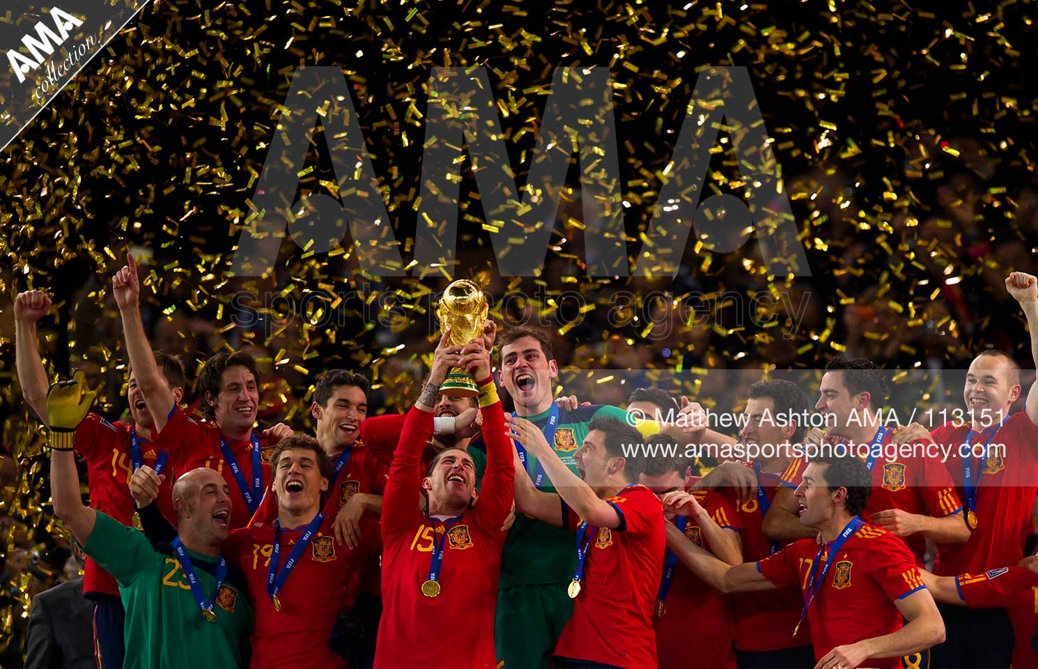 Sergio Ramos of Spain lifts the FIFA World Cup trophy after defeating the Netherlands 0-1