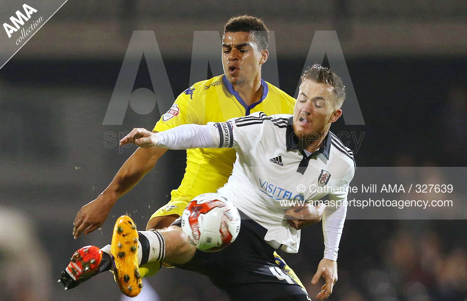 Sky Bet Championship - Fulham v Leeds United - Tom Adeyemi of Leeds United and Ross McCormack of Fulham