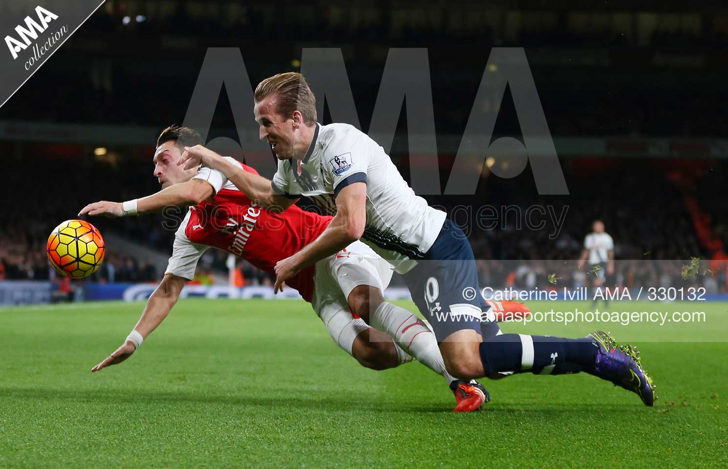 Barclays Premier League - Arsenal v Tottenham Hotspur - Mesut Ozil of Arsenal and Harry Kane of Tottenham Hotspur