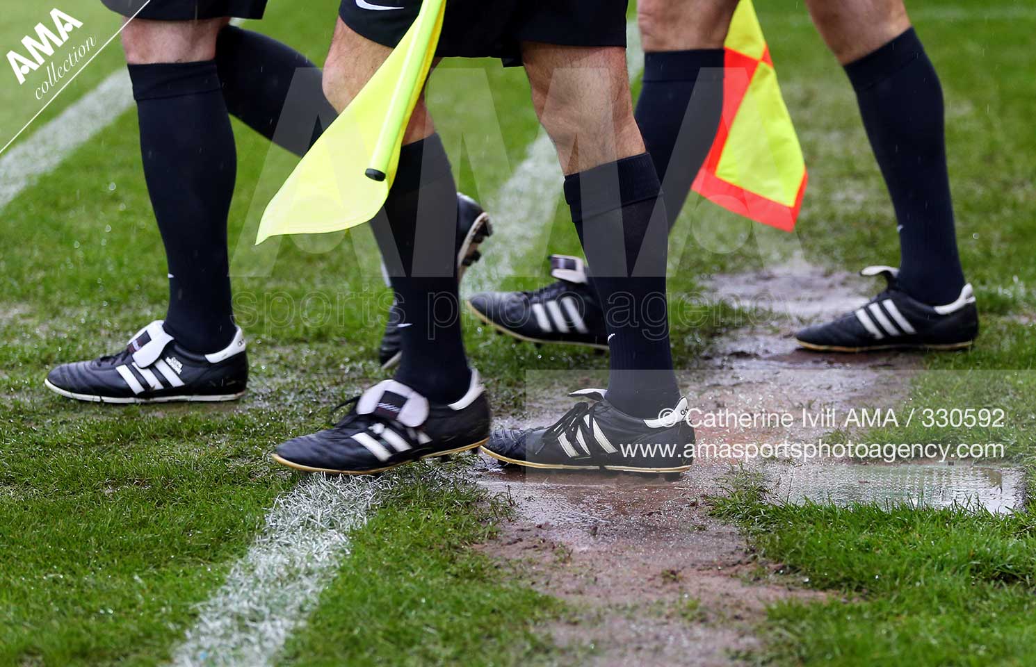 Sky Bet League One - Peterborough United v Fleetwood Town - general view of players boots walking through a wet muddy pitch