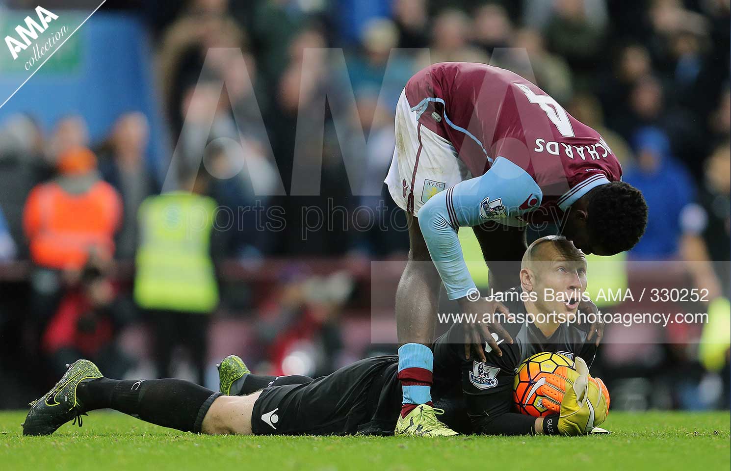 Micah Richards of Aston Villa kisses Brad Guzan of Aston Villa on the head