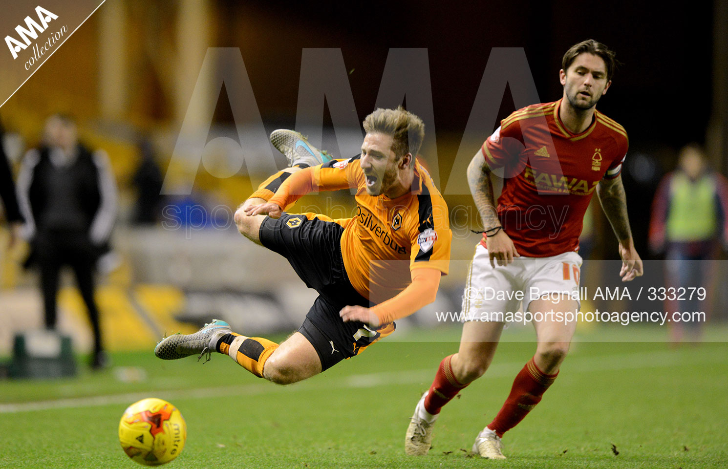 DAVE BAGNALL Sky Bet Championship - Wolverhampton Wanderers v Nottingham Forest - Jordan Graham of Wolverhampton Wanderers fouled by Henri Lansbury of Nottingham Forest