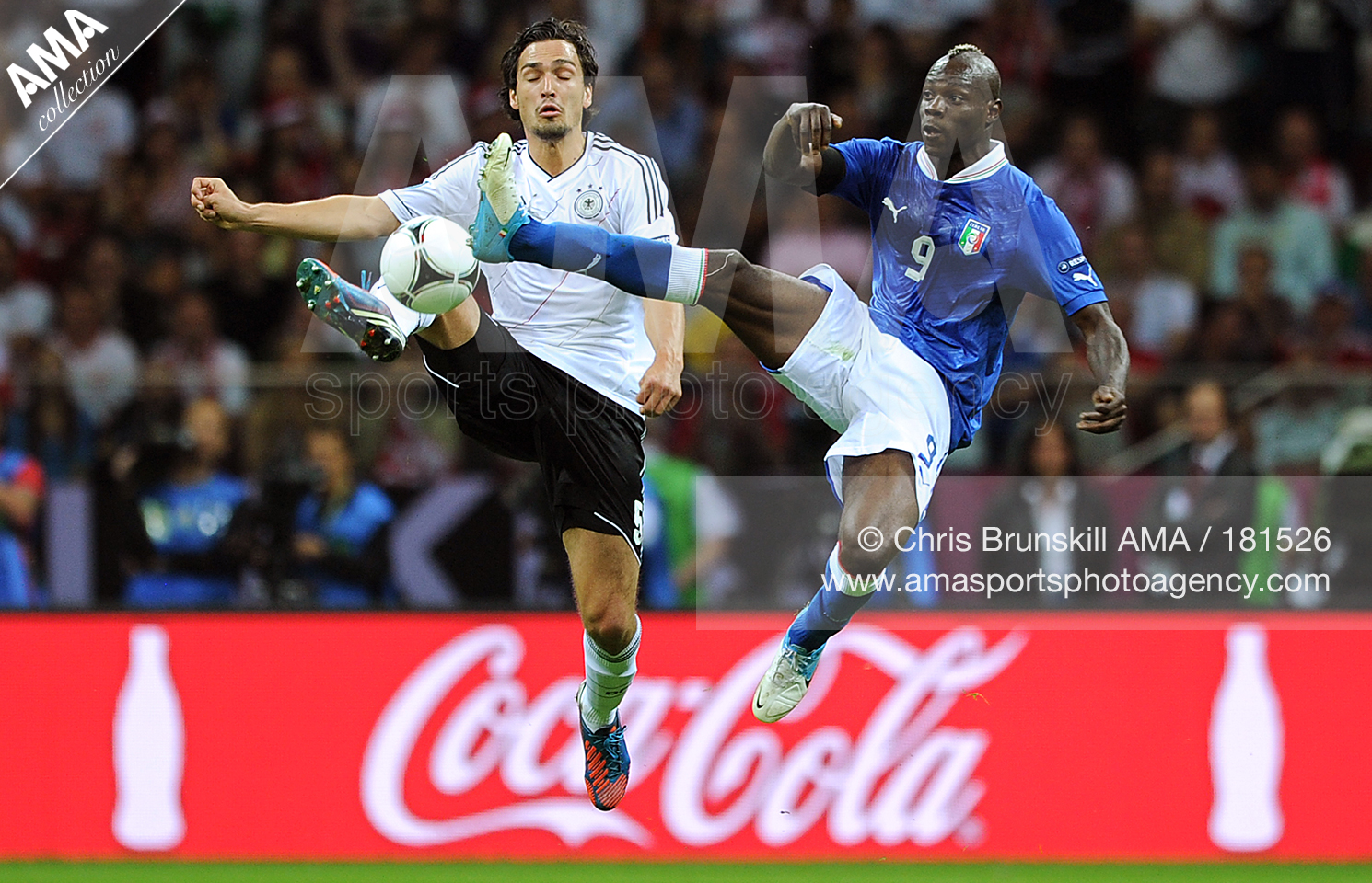 UEFA European Championships  Euro 2012 - Semi-Final - Germany v Italy - Mats Hummels of Germany and Mario Balotelli of Italy 181526 