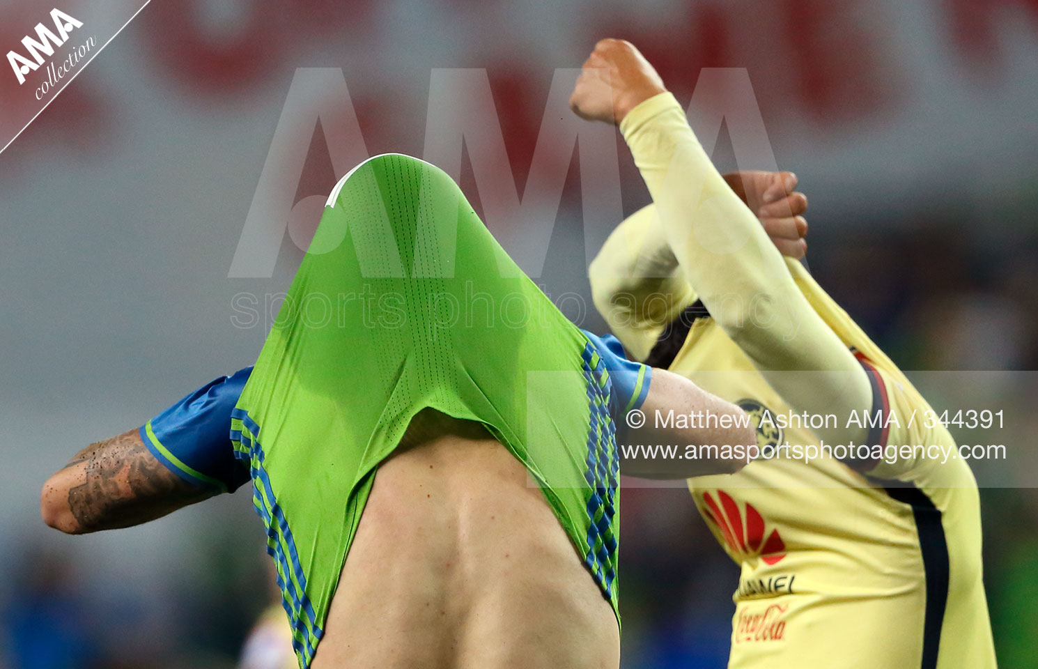 Clint Dempsey of the Seattle Sounders and Miguel Saudi of Club America swap shirts  Matthew Ashton CONCACAF CHAMPIONS LEAGUE AMA