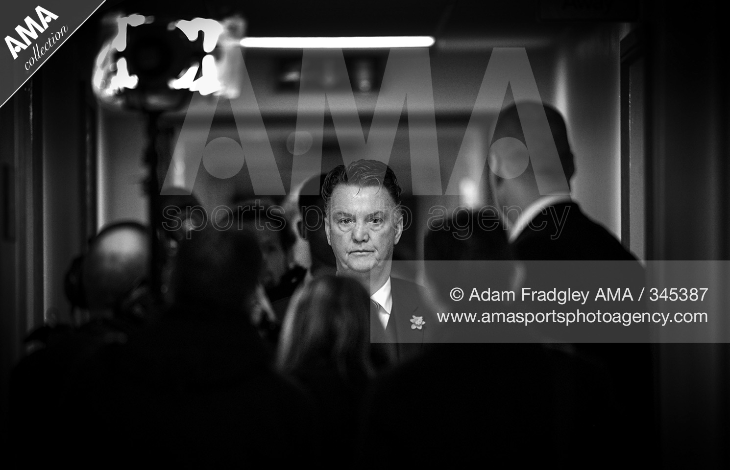 06 March 2016 - Barclays Premier League - West Bromwich Albion v Manchester United - Louis Van Gaal manager / head coach of Manchester United arrives at the Away dressing room entrance at West Bromwich Albion surrounded by TV crews and media © Adam Fradg