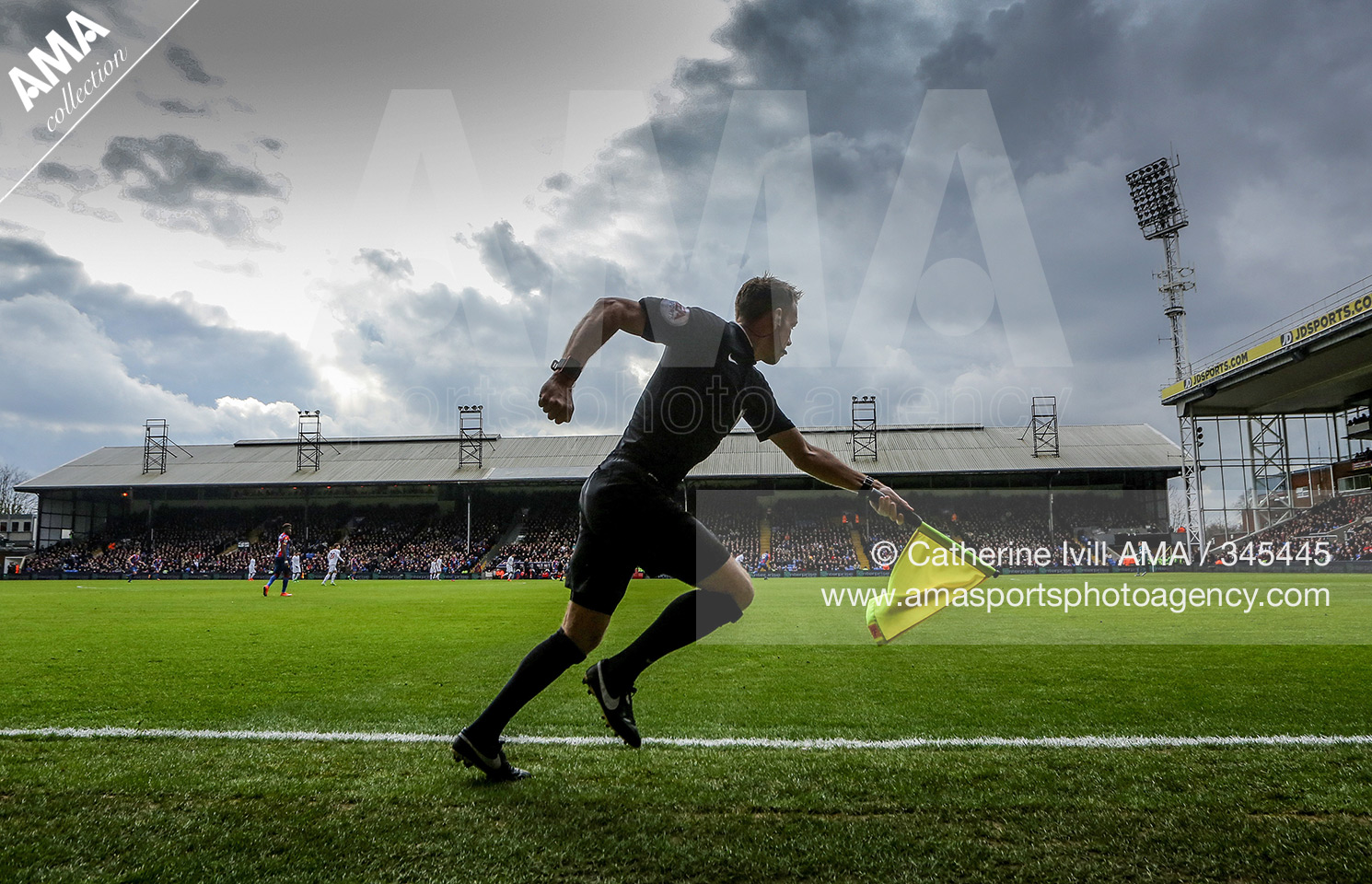 06 March 2016 - Barclays Premier League - Crystal Palace v Liverpool - The assistant referee runs the line at Selhurst Park stadium, home of Crystal Palace © Catherine Ivill / AMA 345445