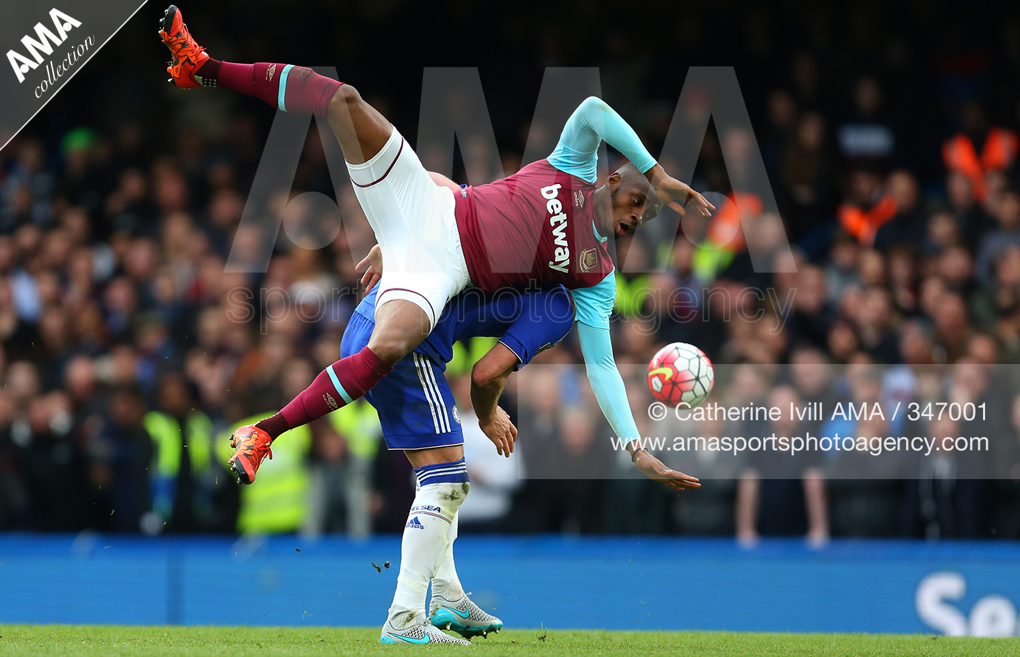 19 March 2016 Barclays Premier League - Chelsea v West Ham United - Diafra Sakho of West Ham United goes over the top of John Terry of Chelsea © Catherine Ivill / AMA 347001