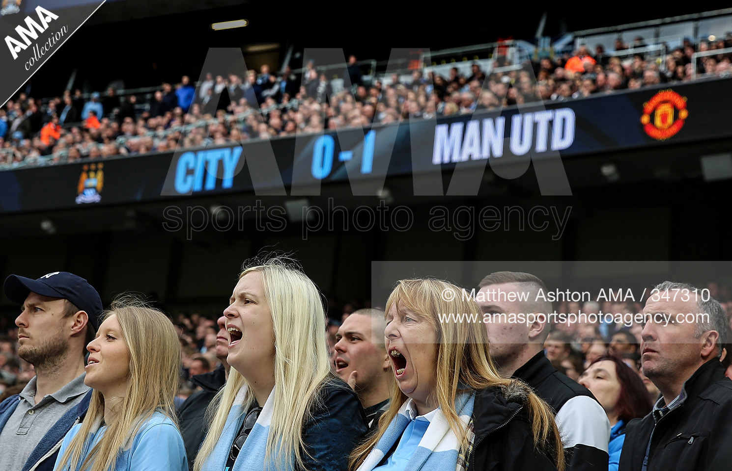 20 March 2016 Barclays Premier League - Manchester City v Manchester United - Manchester City fans show their support as they lose 0-1 to Manchester United © Matthew Ashton / AMA 347310