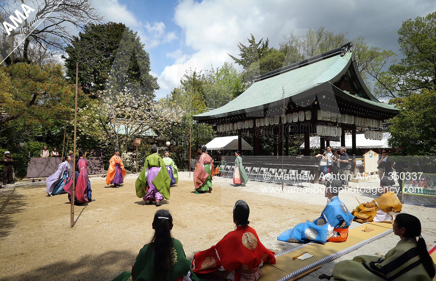 Players put on their ancient leather football boots prior to an exhibition of Kemari at Shiramine Shrine