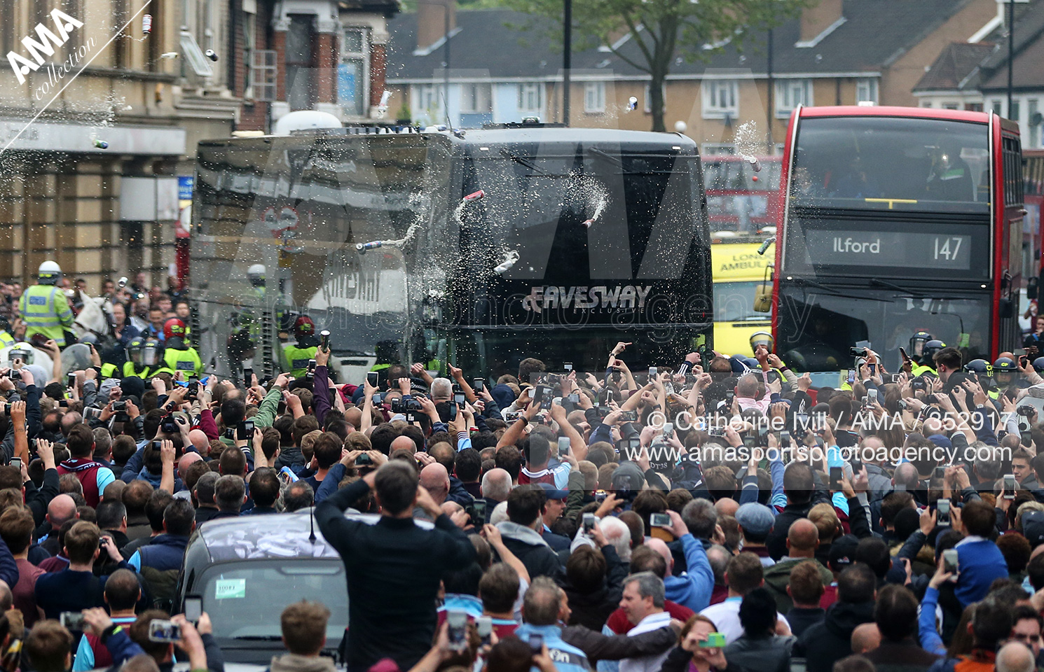 10 May 2016 - Barclays Premier League - West Ham United v Manchester United - Bottles, beer and missiles are thrown at the Manchester United team bus as it tries to make it's way through the crowds that had congregated in the street close to the Boleyn st