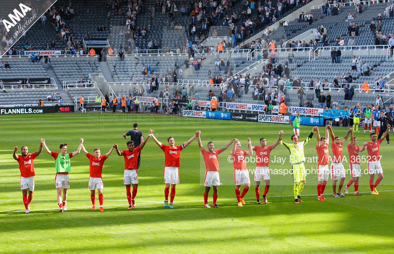 Sky Bet Championship - Newcastle United v Huddersfield Town - Huddersfield Town players celebrate in front of their fans after winning 1-2