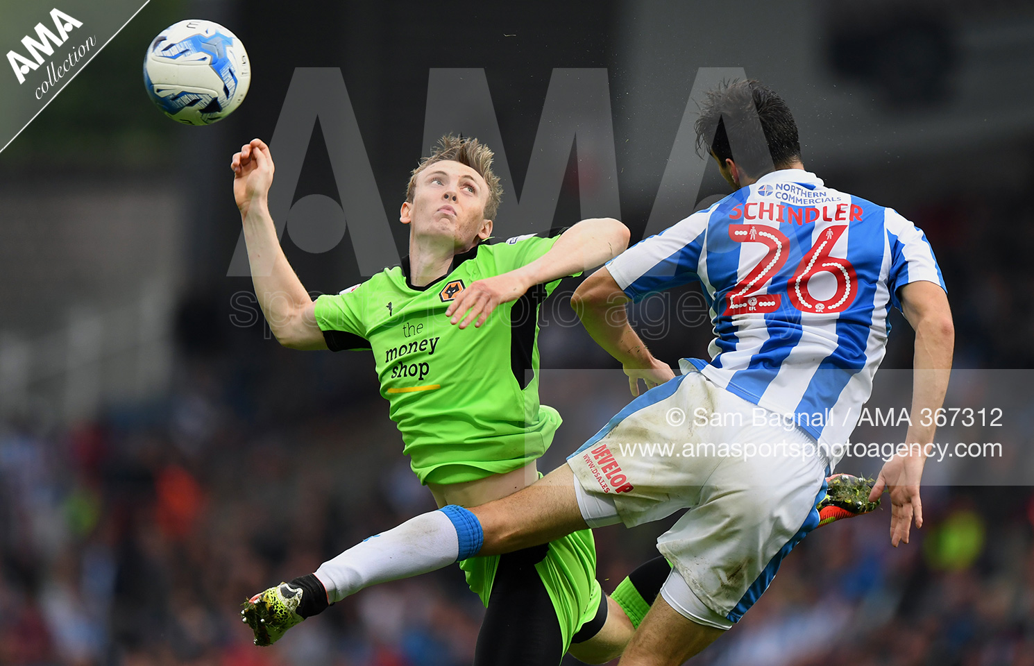 Jon Dadi Bodvarsson of Wolverhampton Wanderers and Chris Schindler of Huddersfield Town