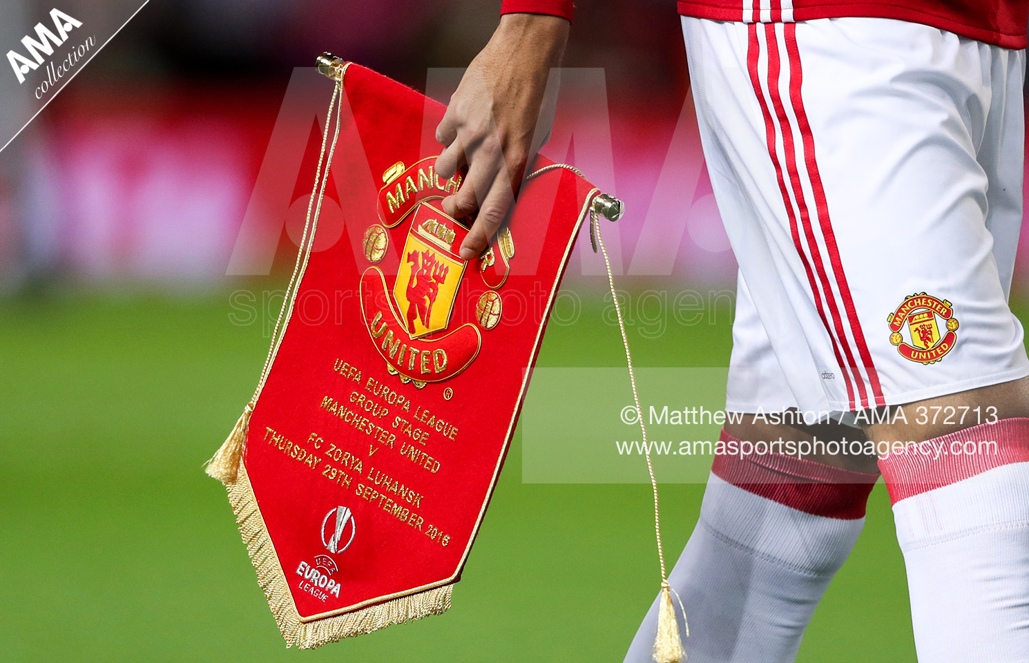 30 September 2016 - UEFA Europa League Group A - Manchester United v FC Zorya Luhansk - Chris Smalling of Manchester United holds the commemorative pennant 372713